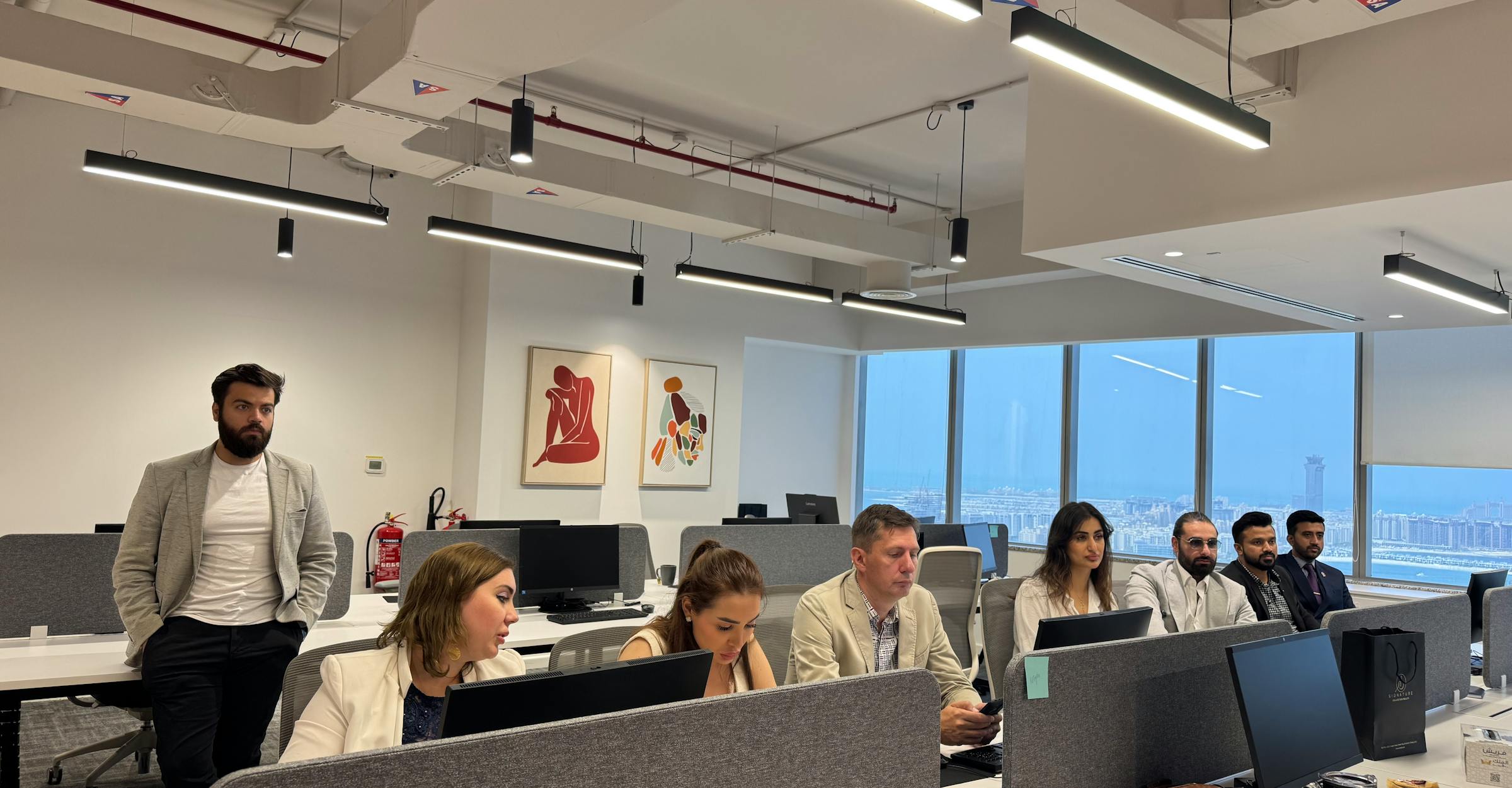 Professional office team collaborating in a modern workspace