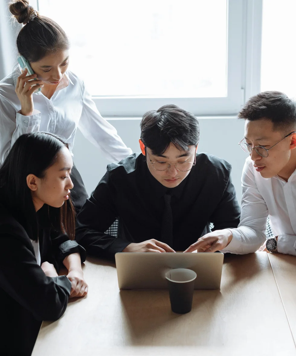 Professional team collaborating in an office environment